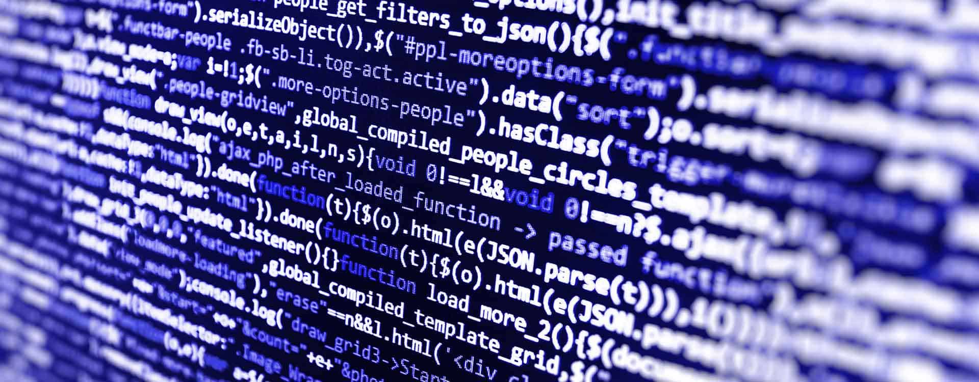 Close-up of a computer screen displaying rows of blue code with functions and variables highlighted in white, reflecting digital data and programming concepts.