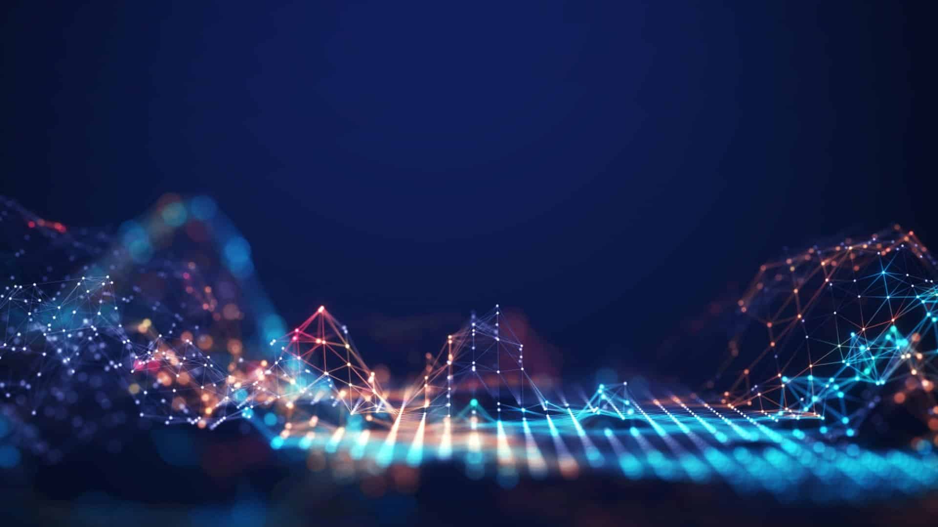Abstract digital landscape with glowing, colorful neon light points and connecting lines forming peaks and valleys, symbolizing data or technology networks.