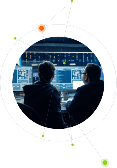 Two people in a Post-RiskIQ SOC observing multiple monitors displaying data, seen from behind, with graphical lines and nodes overlaying the image.
