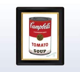 A framed artwork featuring a realistic depiction of a campbell's condensed tomato soup can against a plain background. the frame is black, complementing the simple design of the soup can.