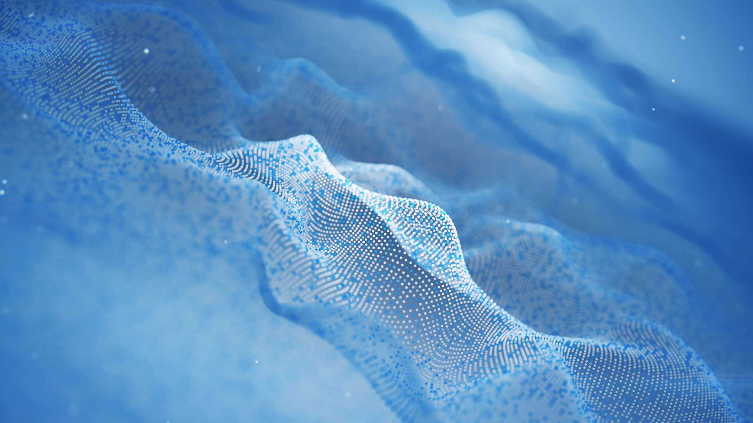 Digital representation of a wave composed of blue particles carrying arbitrary data payloads, highlighting intricate patterns and a sense of motion, set against a soft blue background.