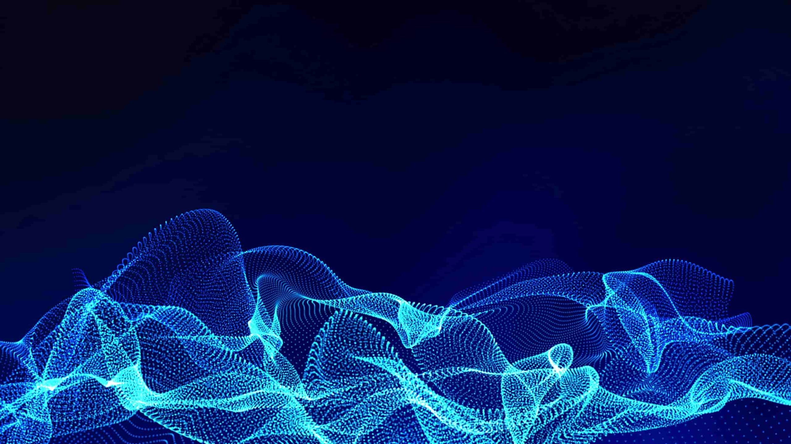 A dynamic abstract image of flowing blue particle waves on a dark blue background, representing data flow or network connectivity in a digital space.