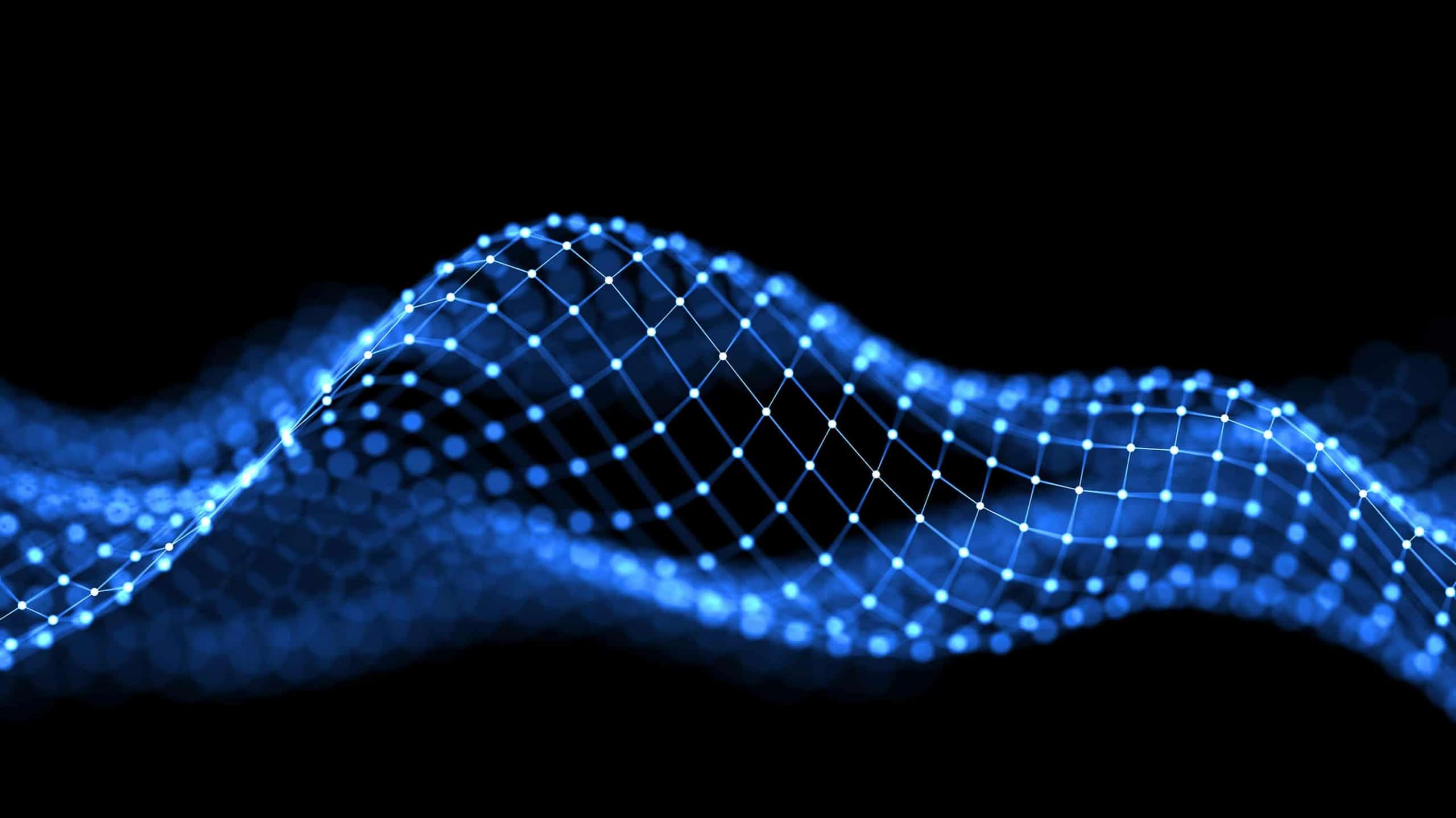 Abstract image of a glowing blue digital wave composed of interconnected dots and lines on a black background, symbolizing futuristic technology or data flow.