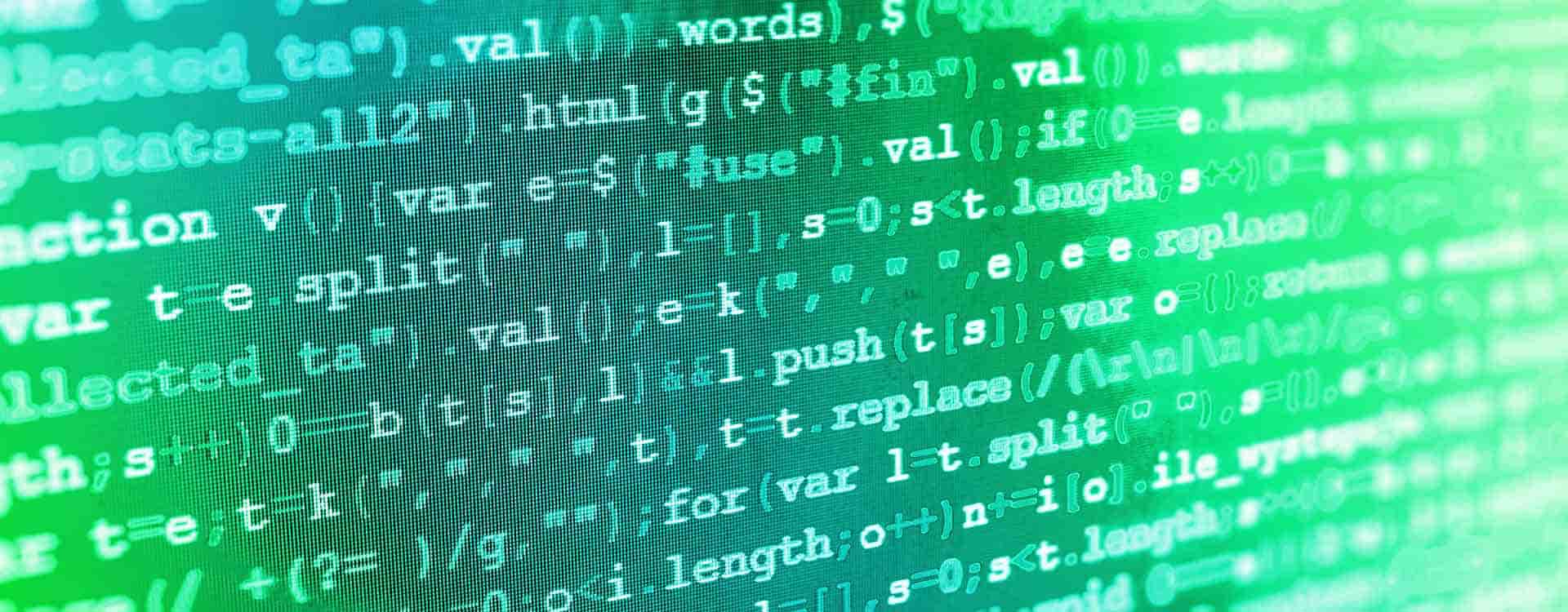 A close-up image of a computer screen displaying programming code in green text on a dark background, emphasizing software development and coding.